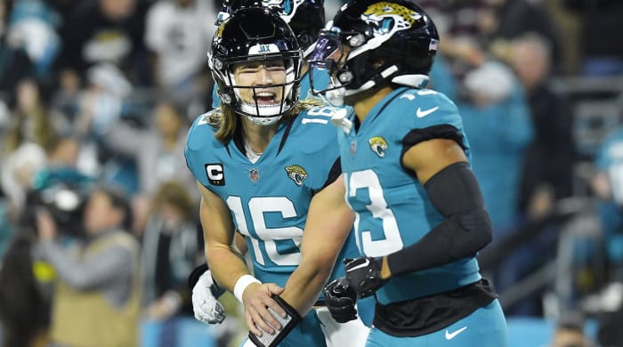 Lawrence celebrates after throwing a touchdown pass to Christian Kirk
